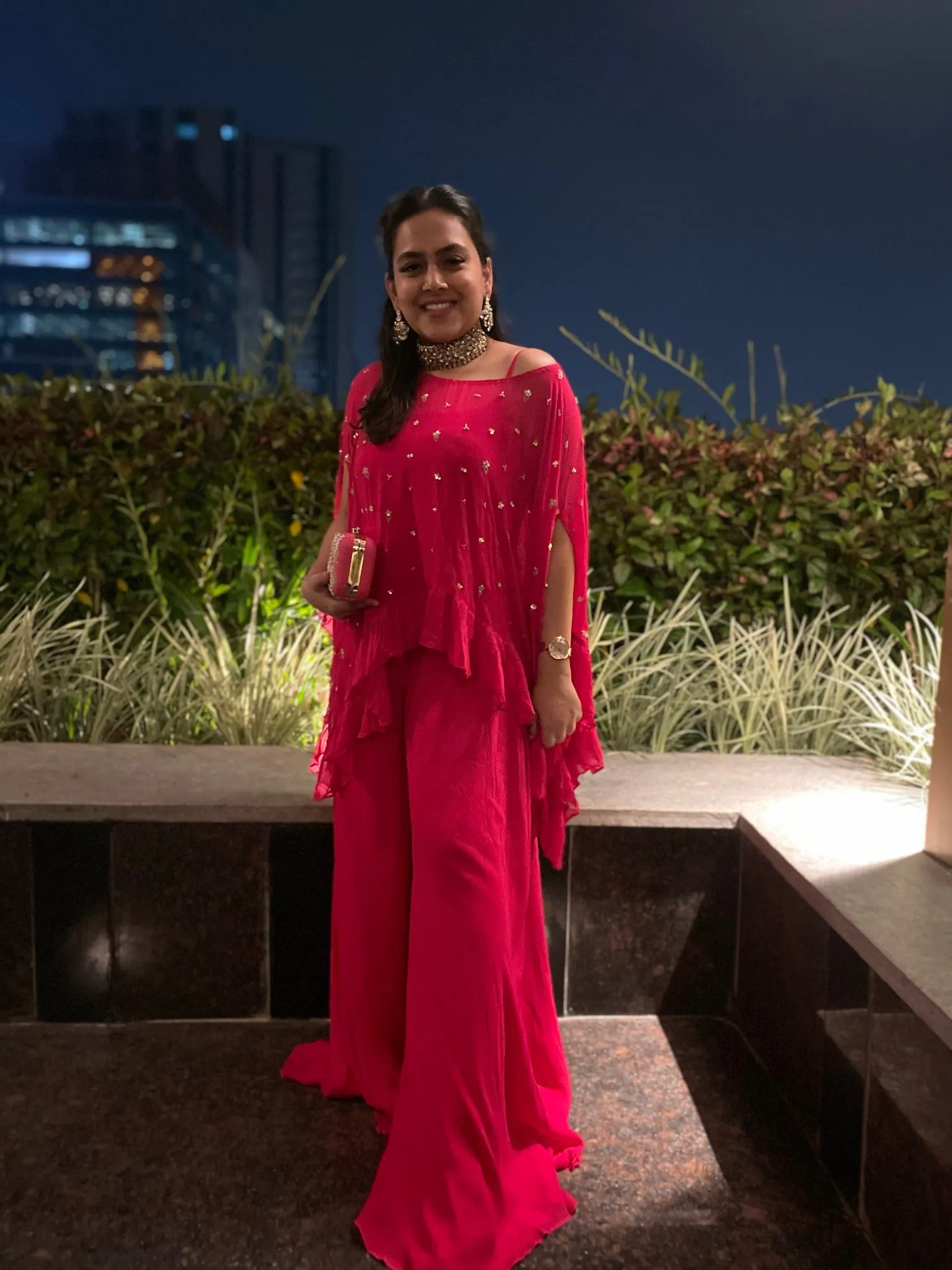 Bhavya Natasha in Fuchsia Jumpsuit with Ruffle Poncho