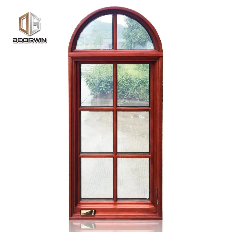 Round top fixed window and bottom crank open window with decorative glazing bars