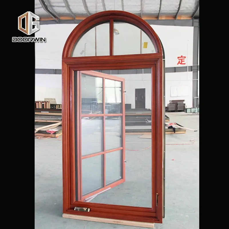 Round top fixed window and bottom crank open window with decorative glazing bars