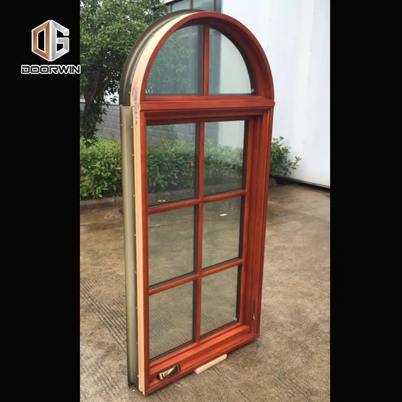 Round top fixed window and bottom crank open window with decorative glazing bars