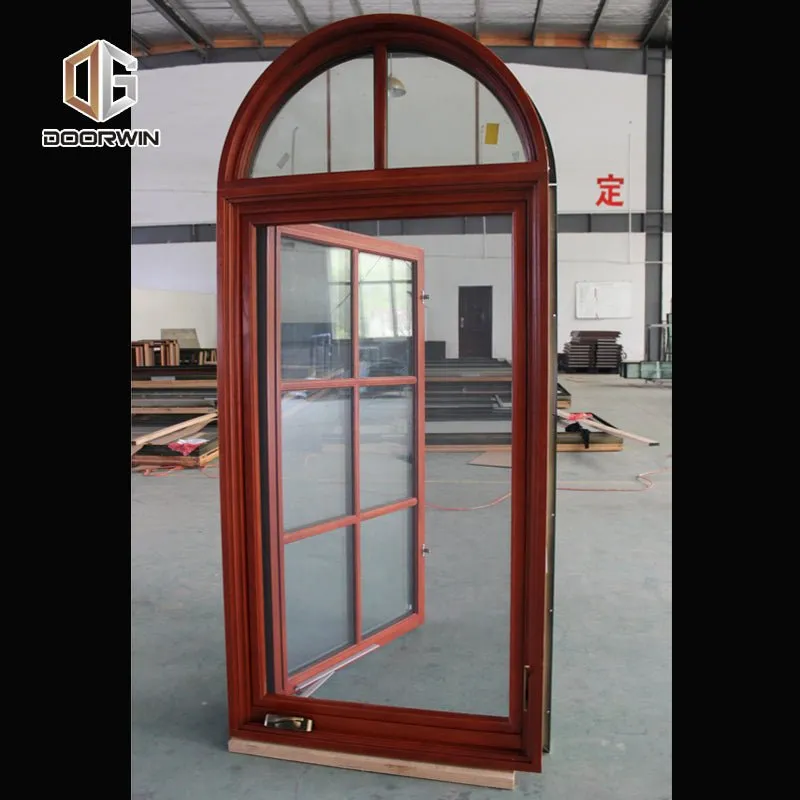 Round top fixed window and bottom crank open window with decorative glazing bars