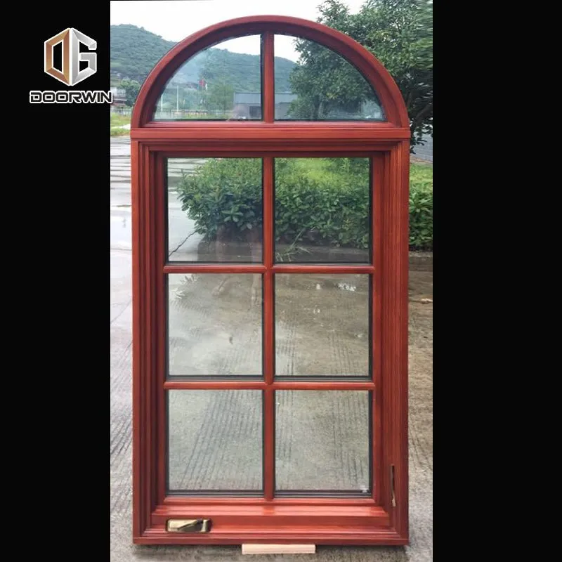 Round top fixed window and bottom crank open window with decorative glazing bars